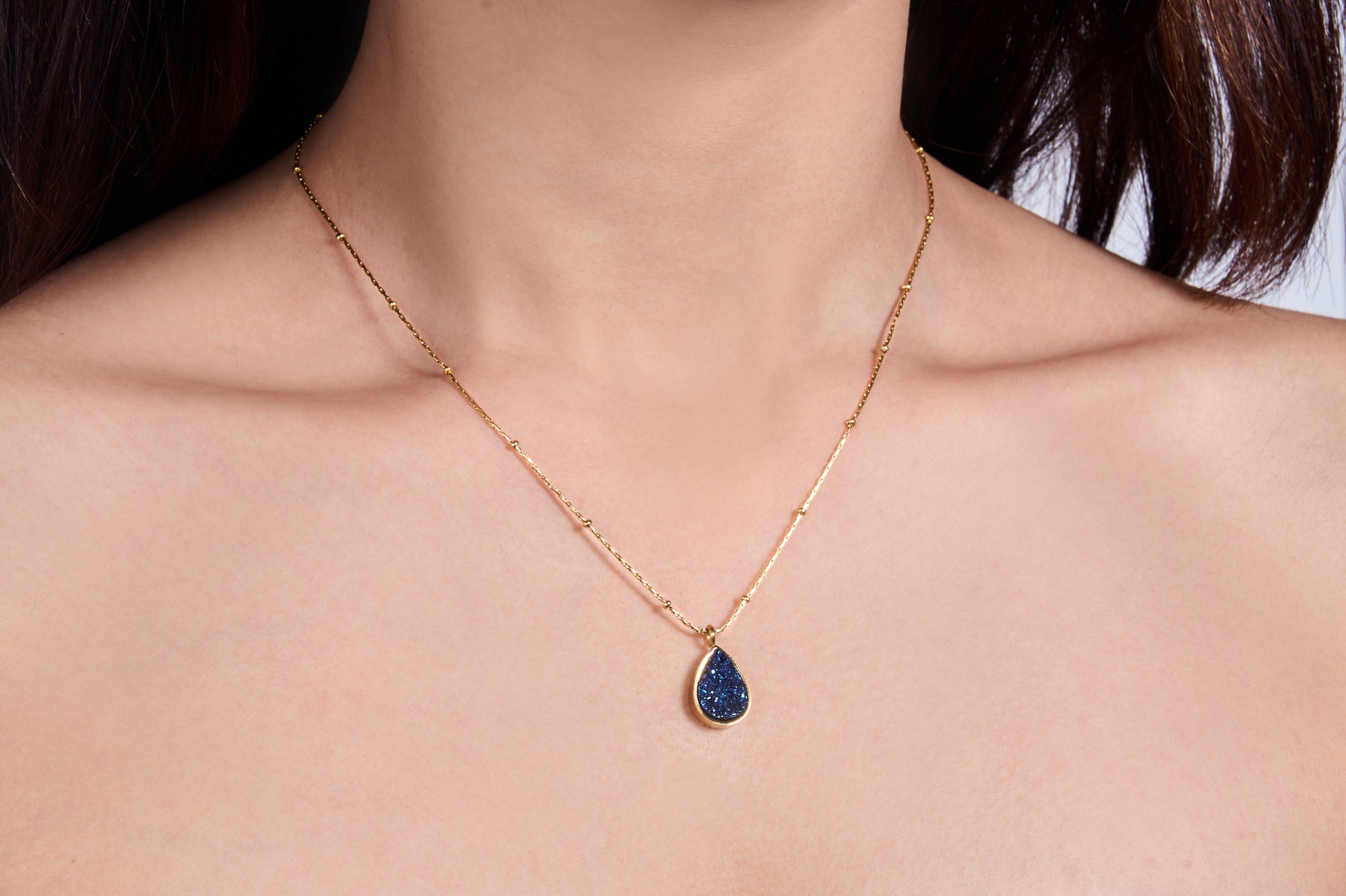 Sapphire Blue Water Drop Pendant in a Bead Chain - Kamora.in